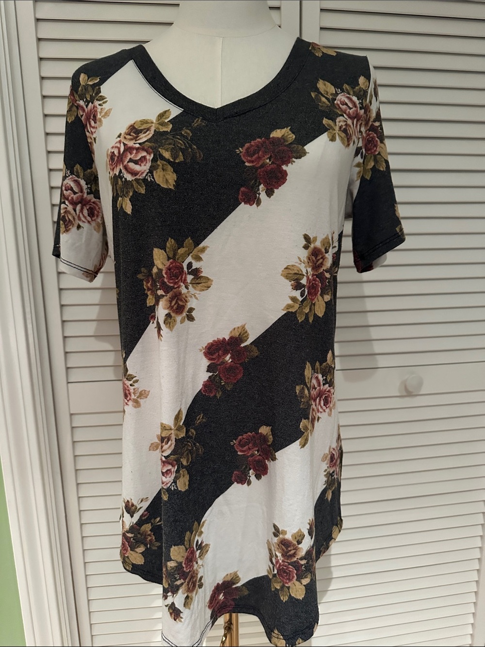 LuLaRoe Black & White Diagonal Stripe V-Neck Top with Rose Print